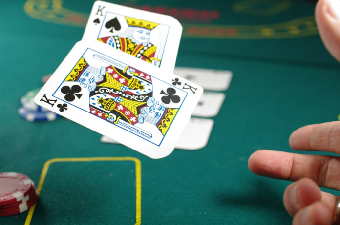 Player using mobile online casino and sports betting platform in Malaysia