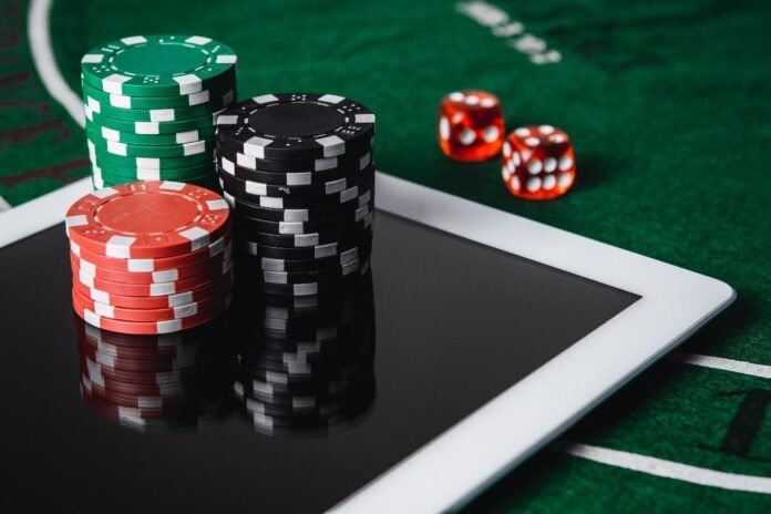 Live dealer at a Blackjack table dealing cards during an online casino game